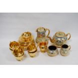 Sadler four-piece tea set and a Royal Winton Grimwades gilt-decorated part tea set.