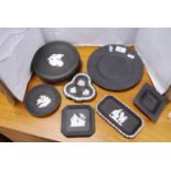 Collection of Wedgwood Black Basalt ware to include plates, clover-shaped and other dishes.  (11)