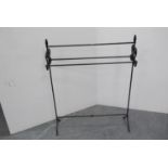 Victorian-style wrought iron towel rail.