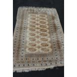 Bokhara rug on a cream ground, 185cm x 122cm.