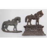 Cast iron doorstop modelled as a horse and another, similar.  (2)