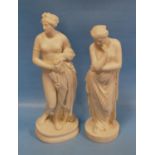 Two Parian ware figures modelled as classical females, one wearing a toga, both on circular shaped