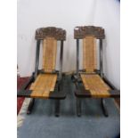 Pair of African-style rattan and hardwood folding pavilion chairs.