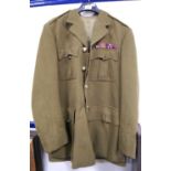WWII period military jacket and trousers with miniature ribbons.