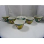 Collection of assorted Oriental sake cups.