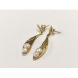 Pair of 9ct gold and pearl-set earrings, 3.2g gross.