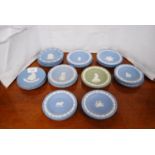 Group of Wedgwood blue Jasper ware pin dishes and one green Jasper ware pin dish.