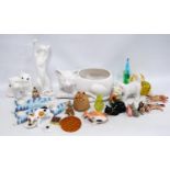 Collection of ceramic and glass cat ornaments, glass paperweight and other glass ornaments.