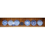 Group of six Wedgwood blue Jasper ware plates, a Wedgwood Greek-style Jasper ware urn-shaped vase