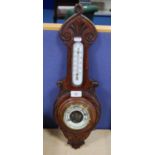 Carved mahogany wall barometer.