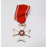 Polish Order of Polonia Restituta, white enamel medal on a red ribbon, dated 1944 to the reverse.