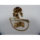 Pair of 9ct gold cufflinks, 4.6g, a costume brooch and a rolled gold clip.