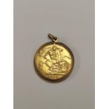 Edwardian gold half sovereign, 1910, in pendant mount.