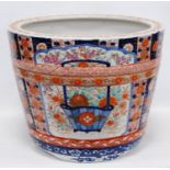 Chinese ceramic jardinière decorated all over with Imari and famille rose floral panels, Kangxi-