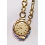 Lady's Rolex watch with shaped bezel, silvered and gilt dial, in 9ct gold case, 47046, 23mm, 1928,