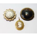 Victorian silver and gold circular brooch, another, with gold band on tortoiseshell, and a Victorian