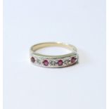 Diamond and ruby ring of eternity style, in 9ct gold.
