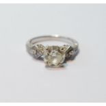 Diamond solitaire ring with brilliant and others, smaller, at the shoulders, 2.23ct, in 18ct gold,