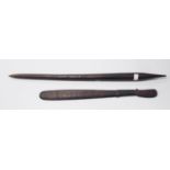 Aboriginal carved club/stick (Nula-Nula) with incised markings to the tip, 82cm long, and an