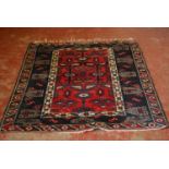 Turkish Dosemealti hand-knotted rug decorated all over with geometric motifs on a red, white and
