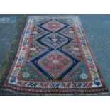 Qashqai-style hand-knotted rug with three geometric medallions to the centre and further geometric