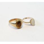 9ct gold ring with tiger's eye and another with chalcedony, sizes P and I.  (2)