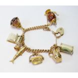 Gold hollow curb bracelet, '15', with padlock and eight charms, 46g gross.