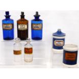 Group of antique clear and coloured glass chemist's jars to include two medium size blue glass