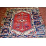 Turkish Dosemealti hand-knotted rug decorated all over with geometric motifs, on a red, white and