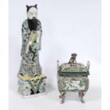 Chinese famille verte pottery figure modelled as an Immortal, fixed to a famille rose base, 32.5cm