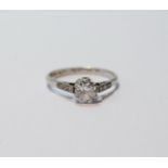 Diamond solitaire ring with old-cut brilliant, approximately .75ct, 'platinum', size N.