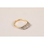 Ladies 18 carat yellow gold and platinum three stone diamond ring; ring size L; gross weight 2.5g