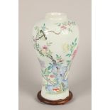 Chinese porcelain famille rose Meiping vase; six character mark to base; 25cm high; on hardwood