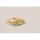 Ladies 9ct gold peridot and seed pearl ring; ring size P; gross weight 3.4g