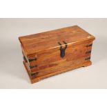 A teak and iron bound blanket box