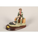 Border Fine Arts model of a Shepherd feeding a lamb