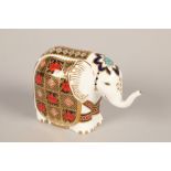 Royal Crown Derby Imari elephant paperweight; with gold button; 10cm high