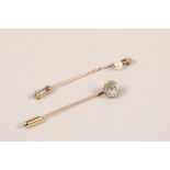 Diamond and pearl gilt metal stick pin; together with one other