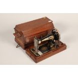 Cased Singer sewing machines