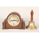 Brass hand bell; 26cm high and a mantle clock; 30cm long