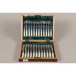 Twelve person mother of pearl handled cased set fruit knives and forks