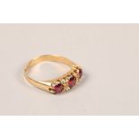 Ladies 18 carat gold three stone garnet ring; ring size O; gross weight 2.7g