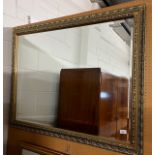 Gilt framed bevel edged hanging wall mirror