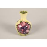 Miniature Moorcroft vase; tube lined with poppy decoration; marks to base; 9cm high