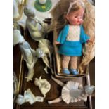 Six Nao and Lladro figures; together with a doll in box