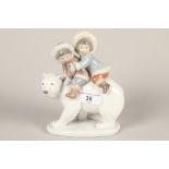 Lladro model of a polar bear with two children on its back; 19cm high