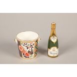 Royal Crown Derby porcelain Imari miniature bucket; together Royal Crown Derby Champagne bottle; 5.