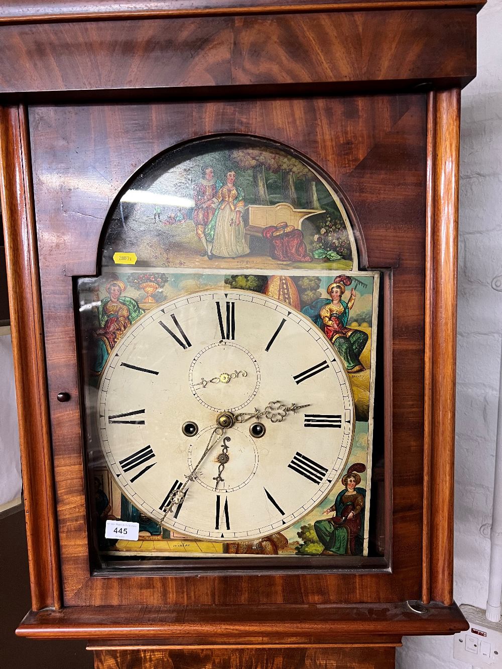 Early 19th century longcase clock with painted dial and twin winding holes