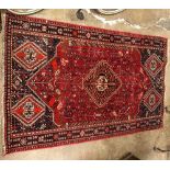 Large red ground Middle Eastern rug / carpet 257cm x 159 cm