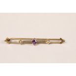 9 carat yellow gold amethyst and seed pearl bar brooch; 5cm long; gross weight 1.5g